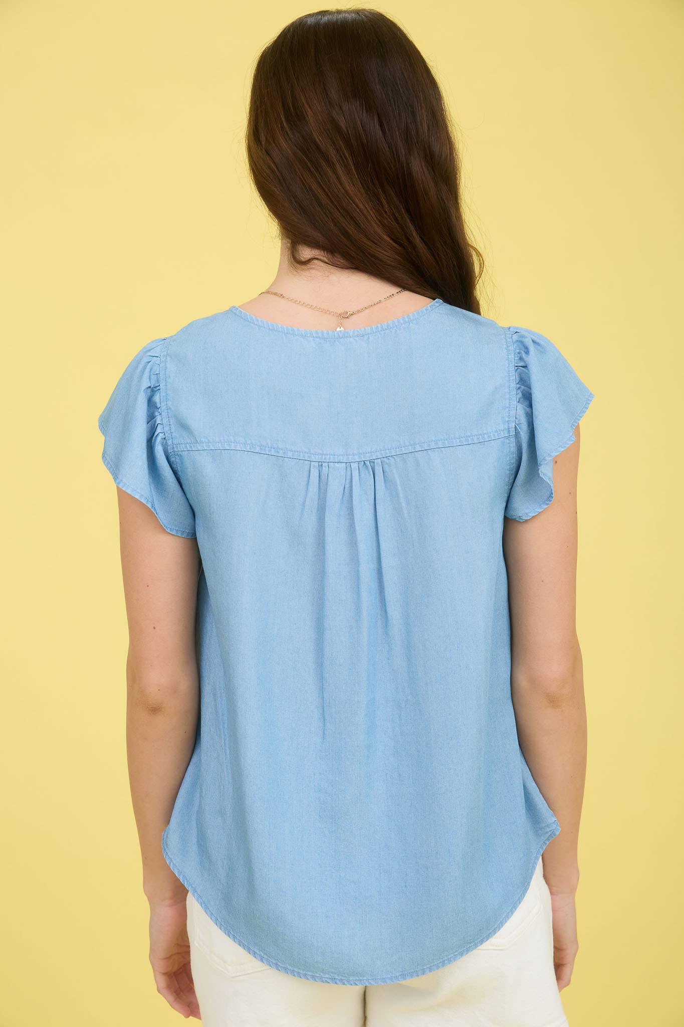 V NECK HALF BUTTON RUFFLE SLEEVE CHAMBRAY TOP