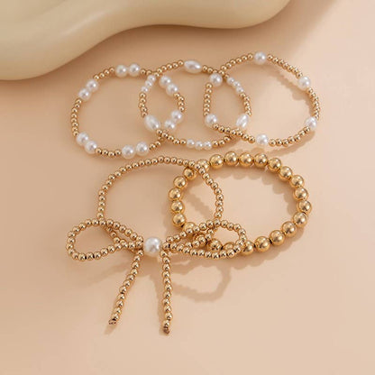 Multi Layer Bow Bracelet Stack