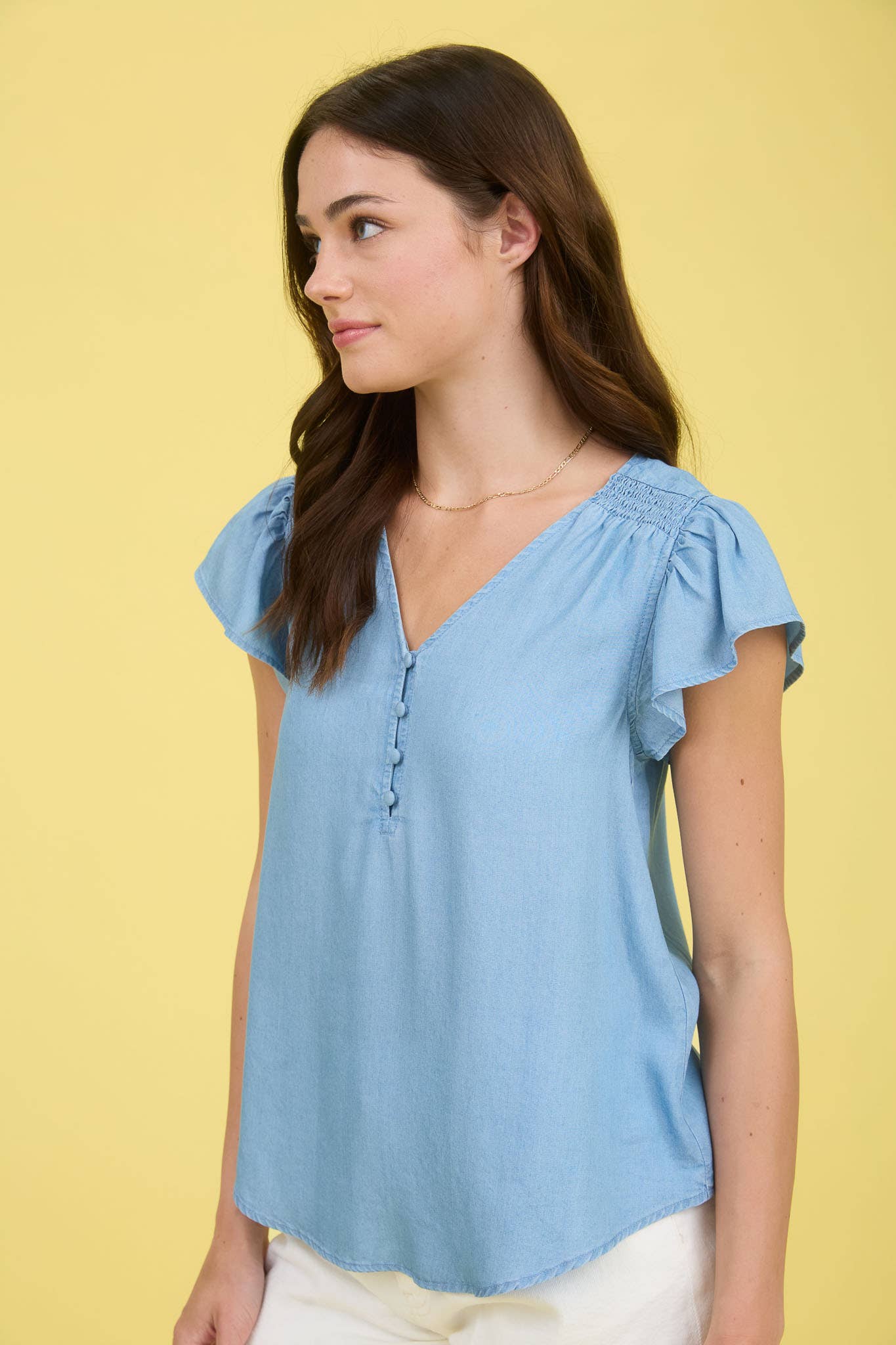 V NECK HALF BUTTON RUFFLE SLEEVE CHAMBRAY TOP