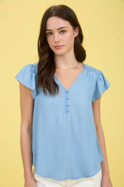 V NECK HALF BUTTON RUFFLE SLEEVE CHAMBRAY TOP